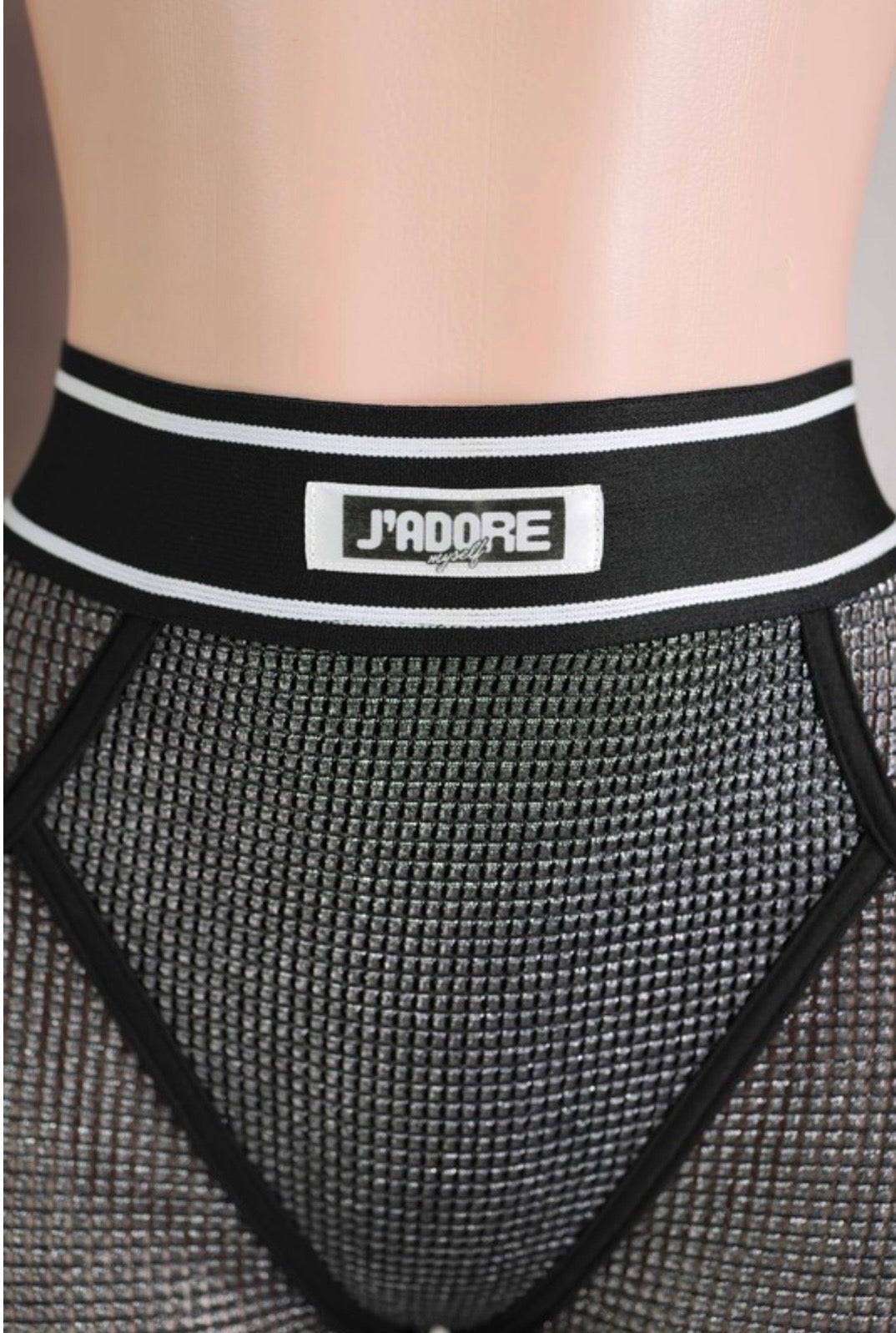 Make a daring statement with the Popcorn Mesh Label Two-Piece Set, your new go-to for bold, confident style. This mesh crop top and legging combo features a sleek logo waistband and body-hugging stretch that highlights every curve.